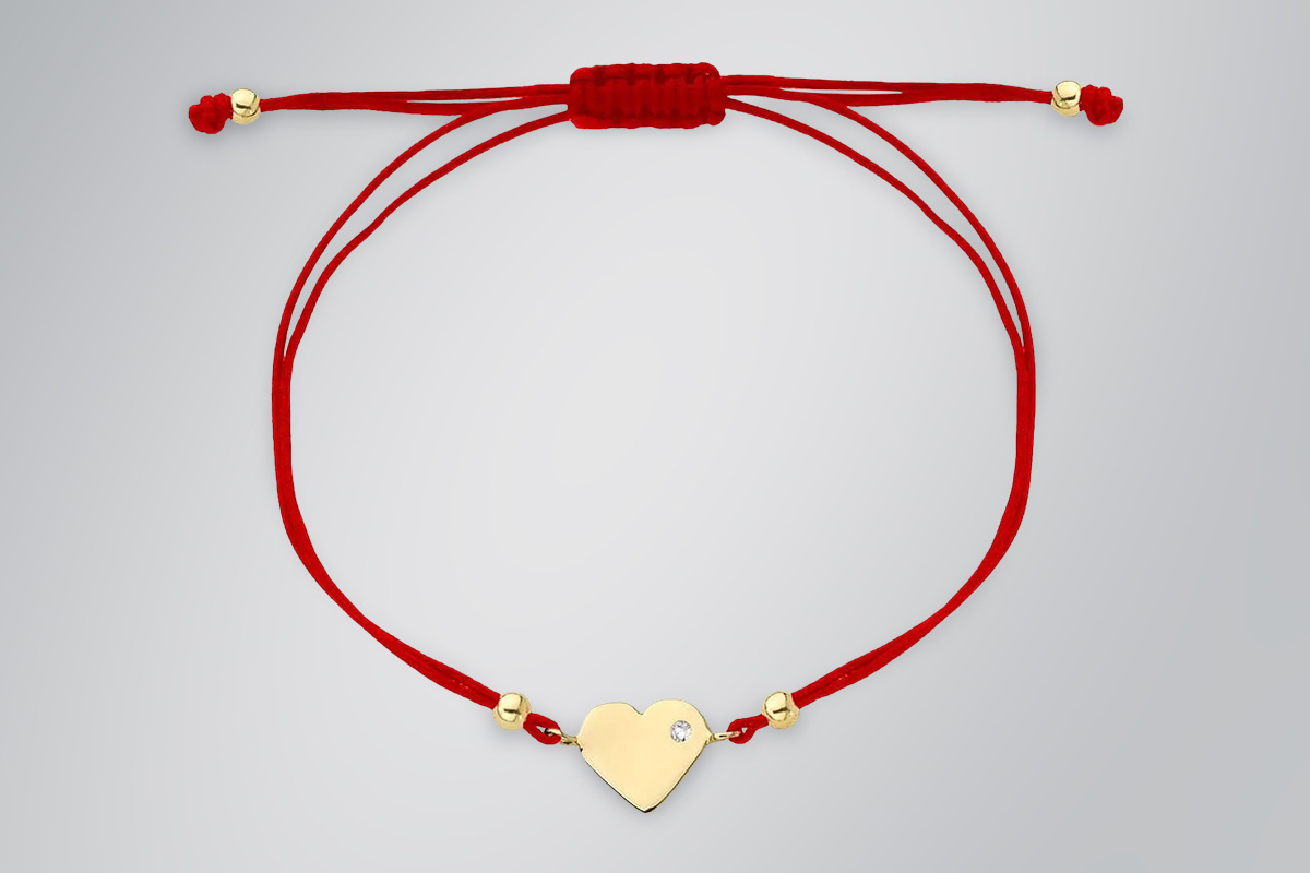 bransoletka z czerwonego sznurka złotej zawieszki serce marki Bonore